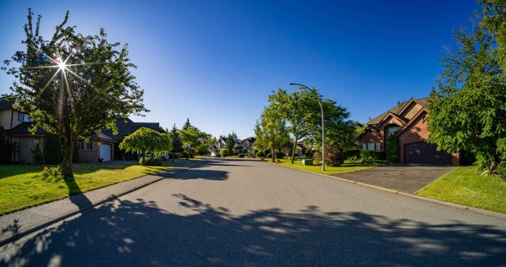 Residential Homes in a suburban city street sunny morning. Surrey, Vancouver, BC, Canada.